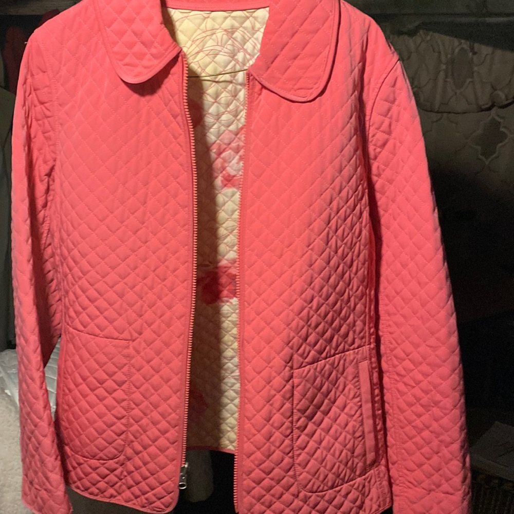 Pretty in pink this jacket is in good condition